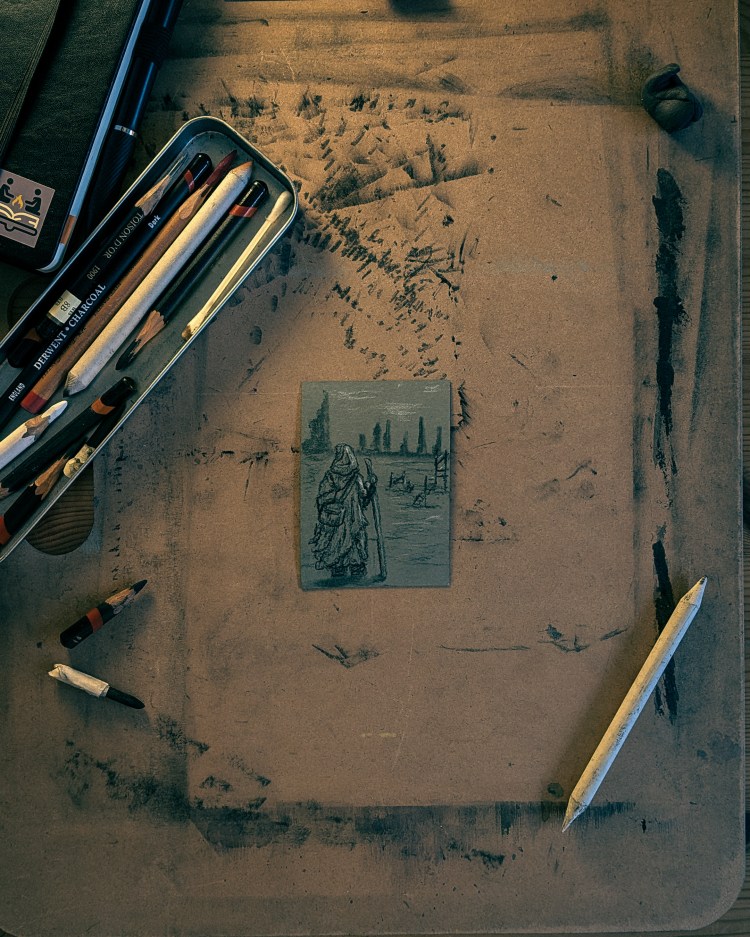 Original ACEO hand-drawn art card - Fantasy art taveller in cloak looking out towards a ruined skyline